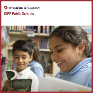 Image of two elementary students reading books